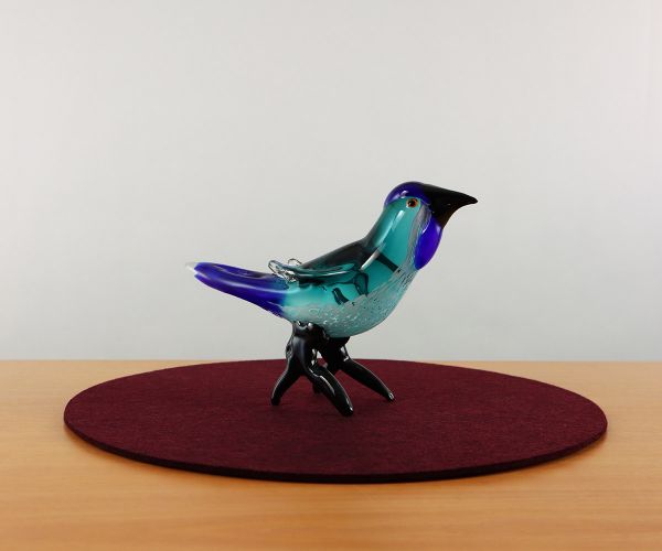 Glastier blauer Vogel