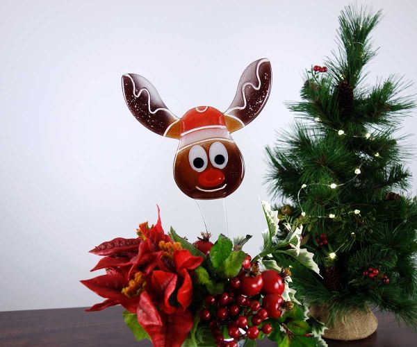 Rentier aus buntem Kristallglas auf Glasstab