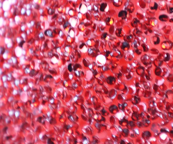 Windlicht aus Glas mit Pailletten in Rot