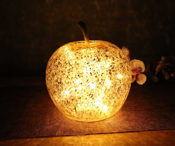 Goldener Apfel aus Glas inkl. Lichterkette